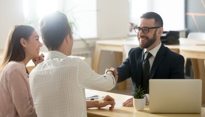 A couple meeting with a financial planner.