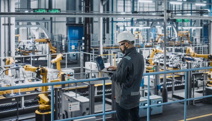 A worker in a car factory